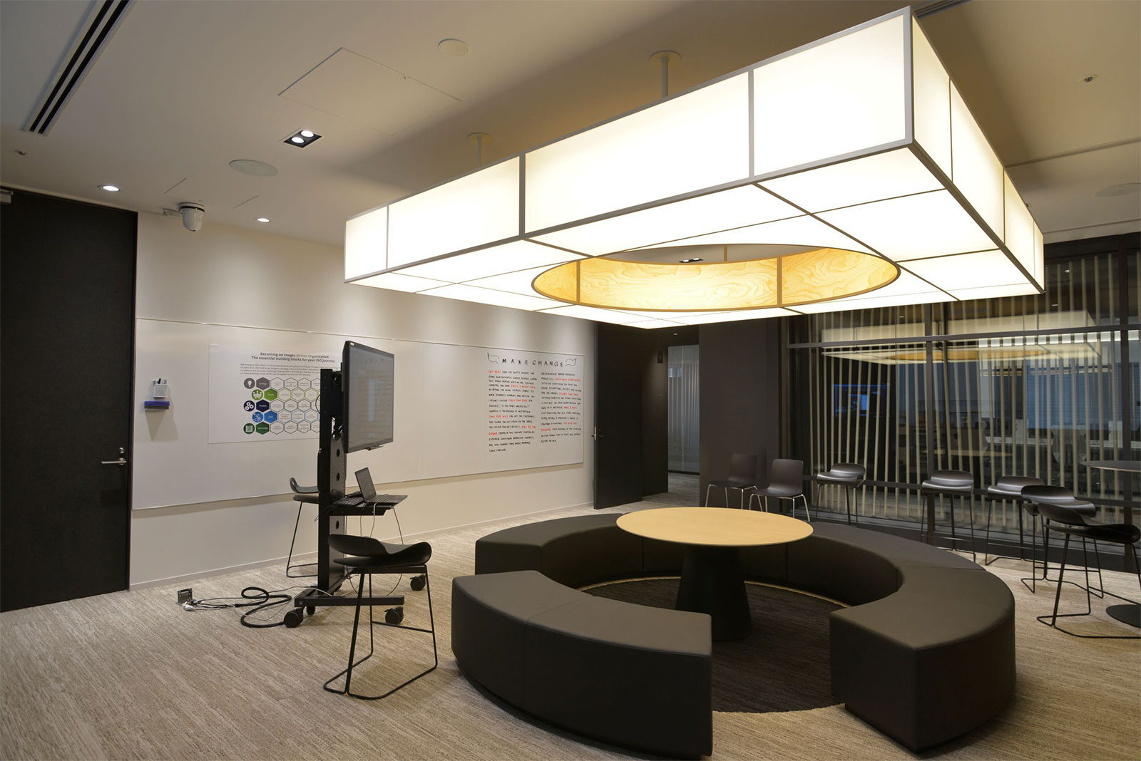 The "harmony room" has a friendly atmosphere created by a large Japanese-style light in the center.
